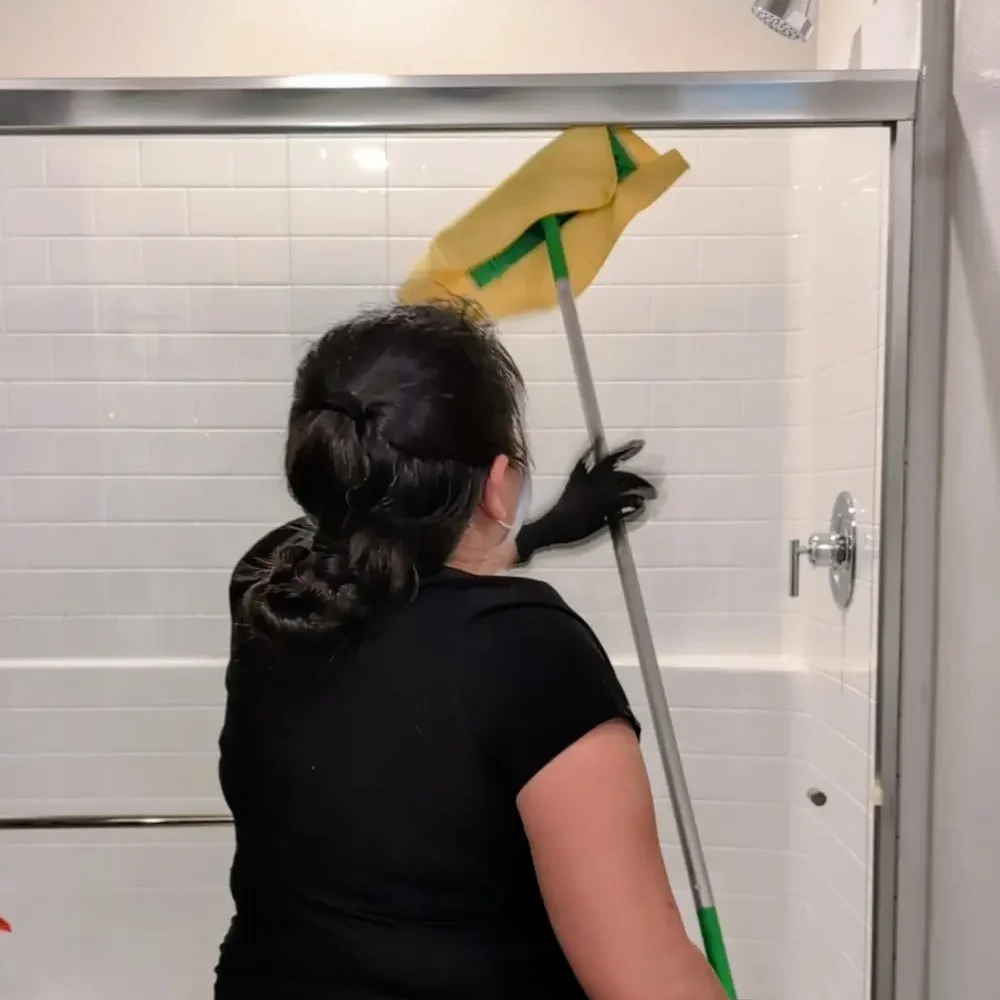 Shower cleaning 2, Jireh Nevada Services cleaner