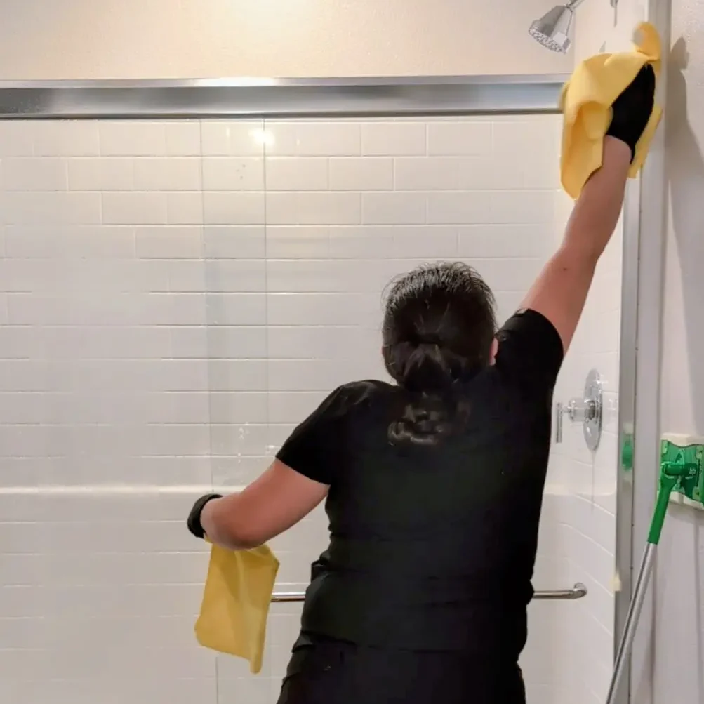 Shower cleaning, Jireh Nevada Services cleaner